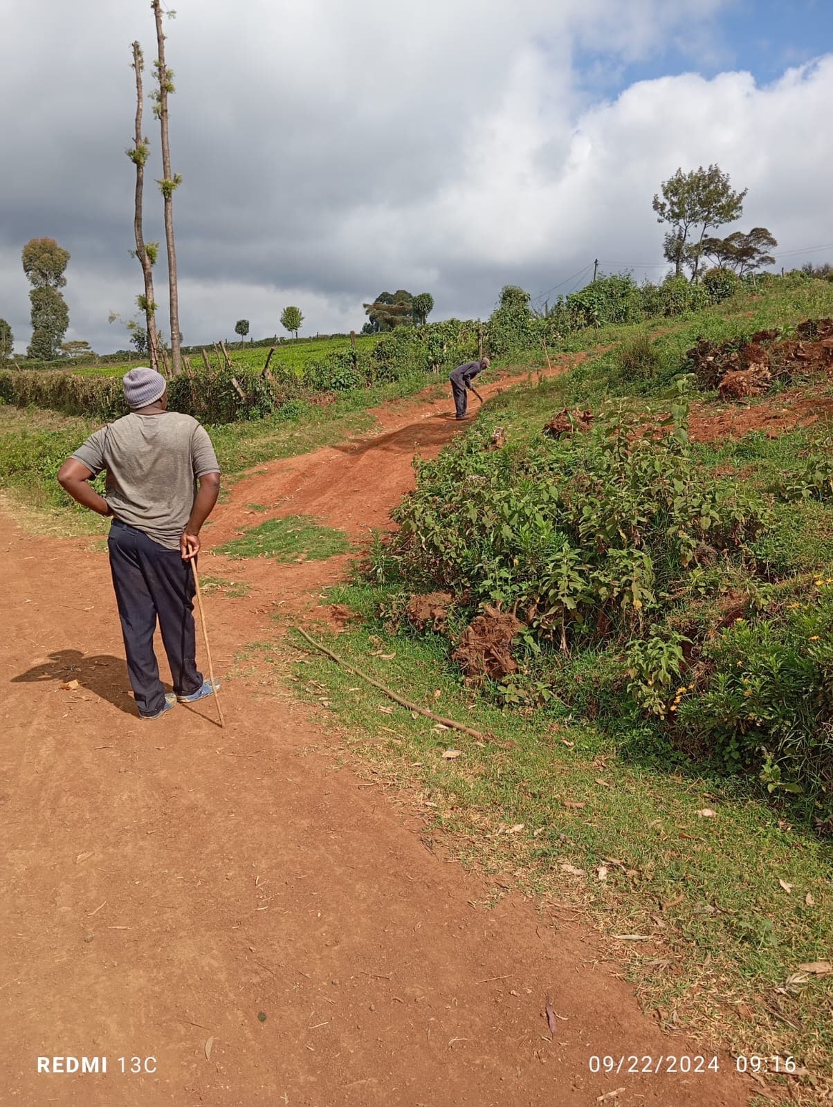 Community member surveying the land development
