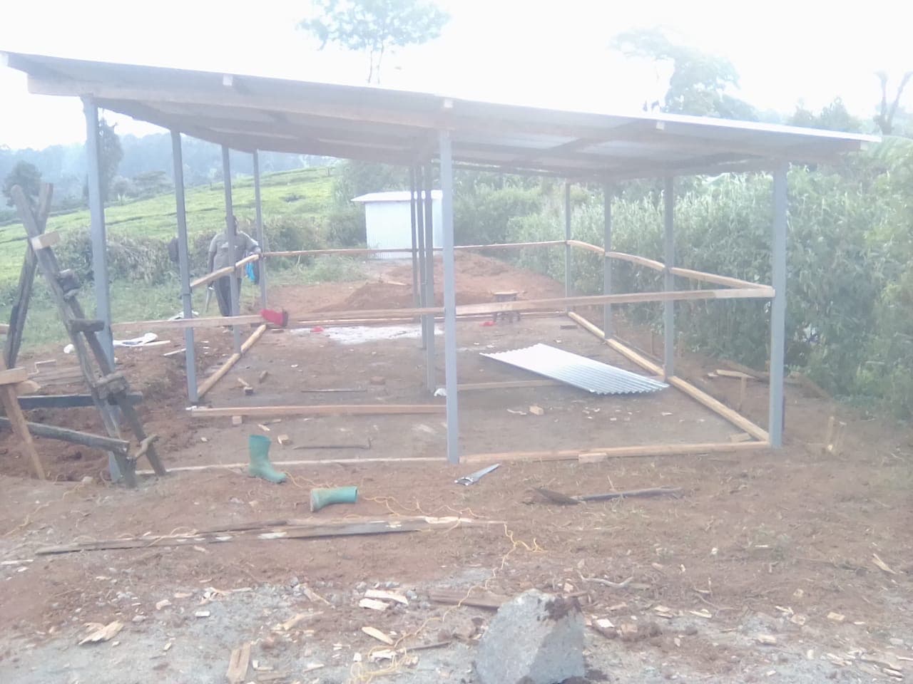 Building structure taking shape with metal framework and roofing