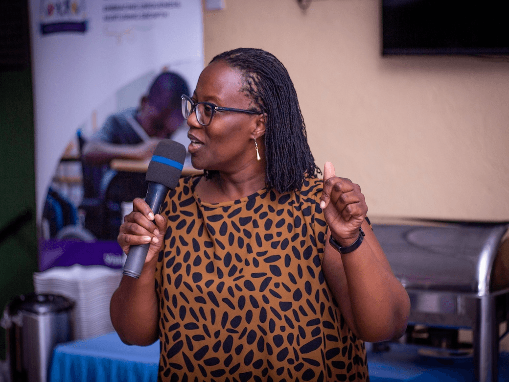 Speaker presenting at fundraising event