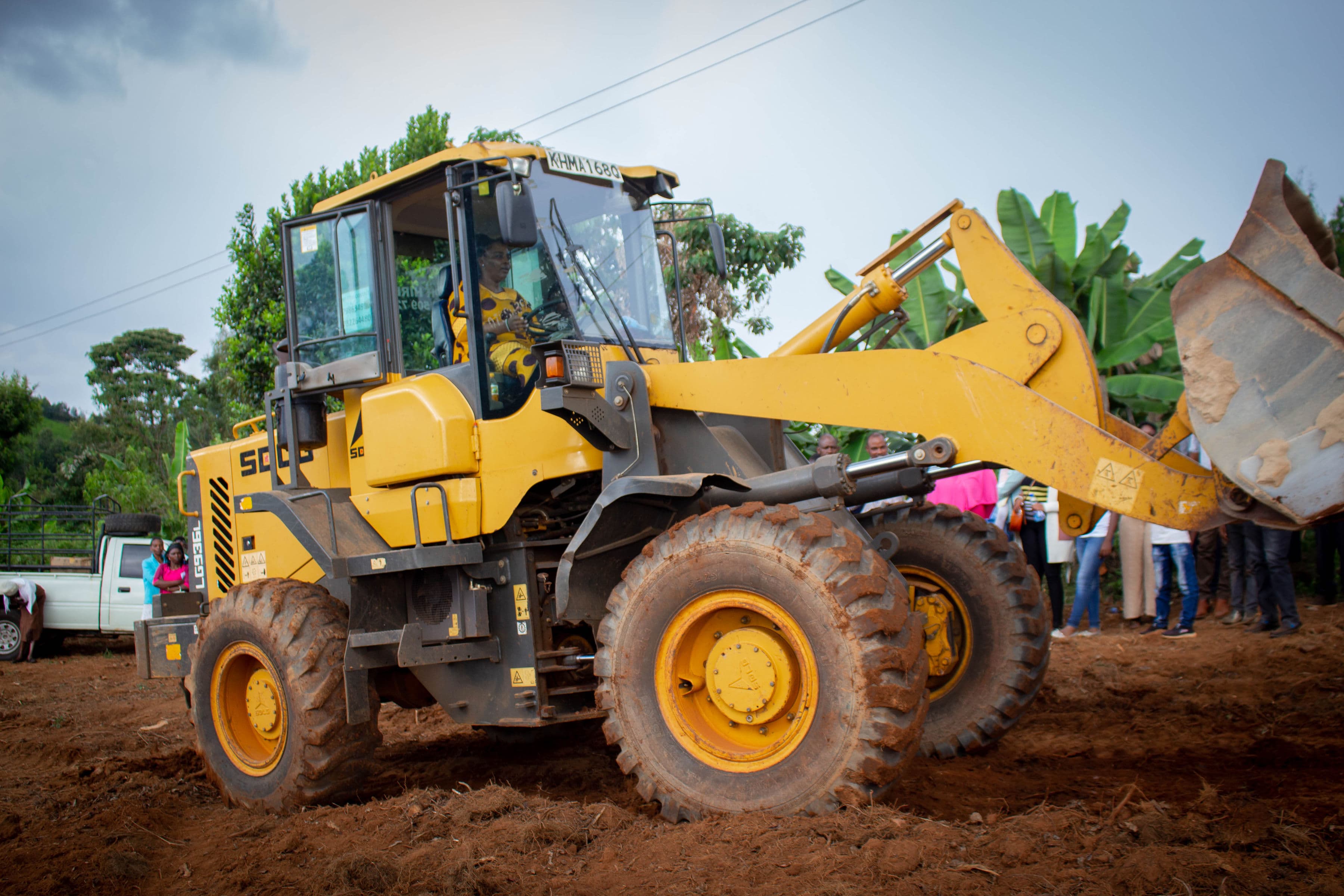 Groundbreaking ceremony with excavator