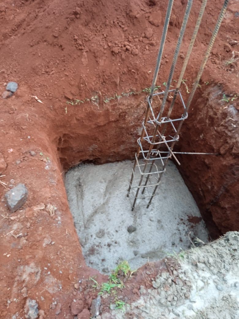 Foundation footing with steel rebar reinforcement cage